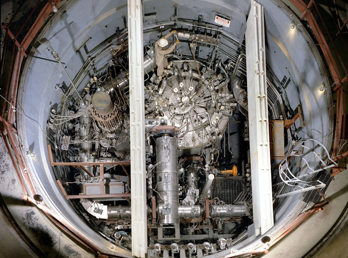 Overhead view into the Molten Salt Reactor Experiment at Oak Ridge National Laboratory, showing the reactor vessel, fuel pump and heat exchanger inside the reactor cell