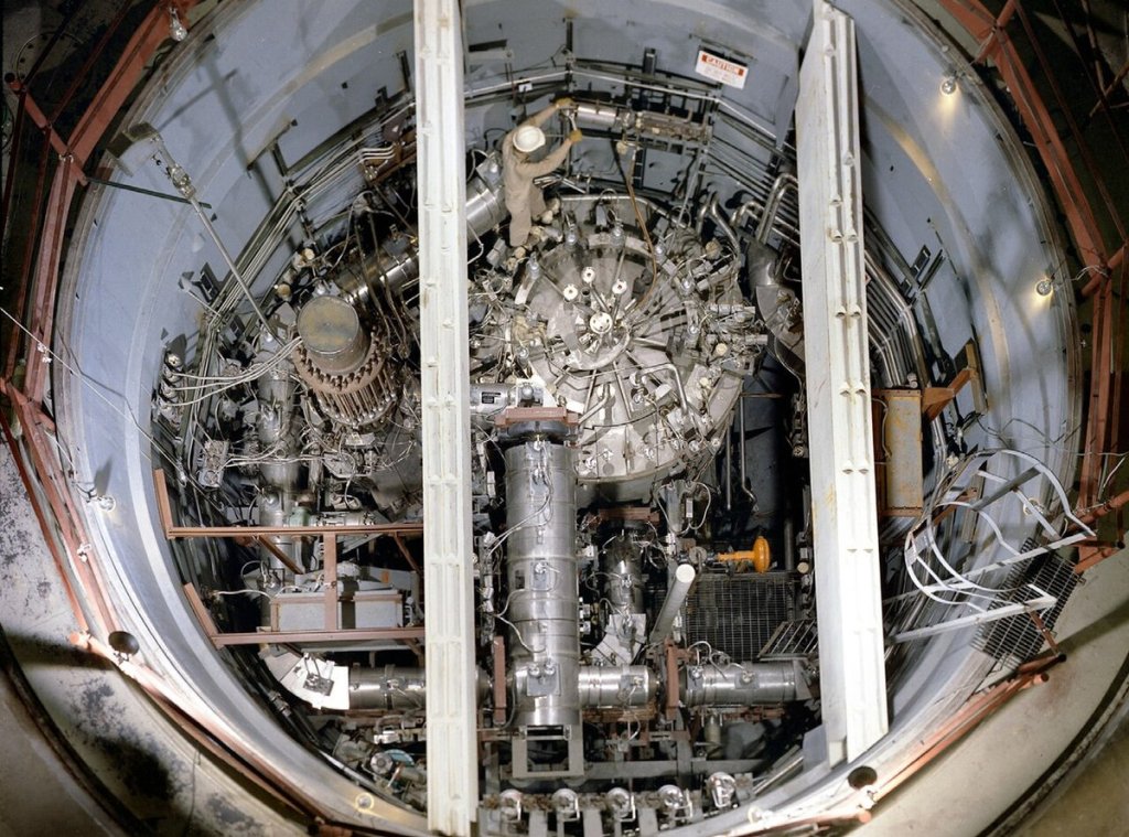 Overhead view into the Molten Salt Reactor Experiment at Oak Ridge National Laboratory, showing the reactor vessel, fuel pump and heat exchanger inside the reactor cell